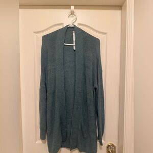 Lululemon Merino Wool-Blend Ribbed Long Wrap Sweater
Heathered Tidewater Teal